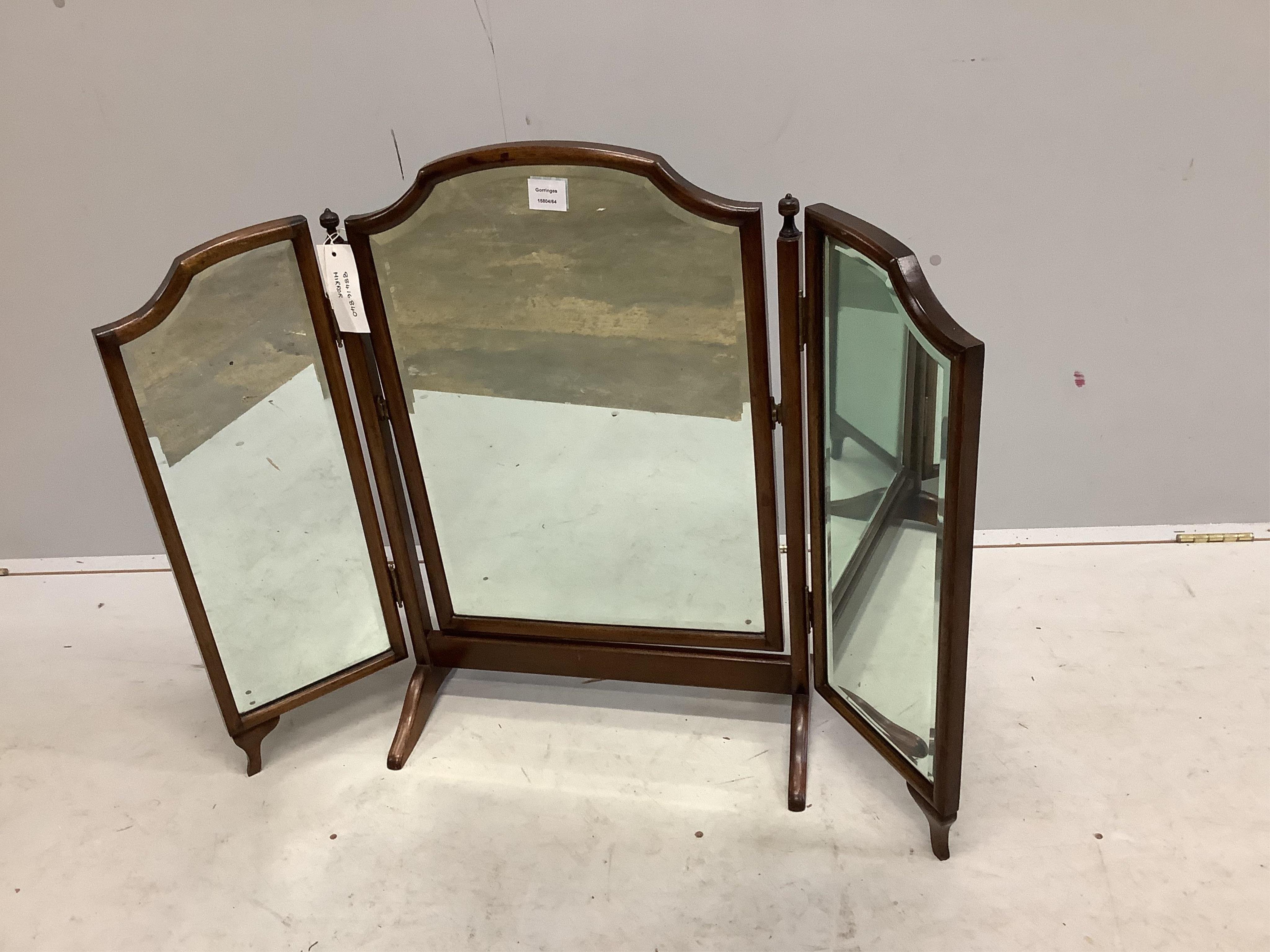 A Queen Anne revival walnut triple plate toilet mirror, height 75cm. Condition - fair